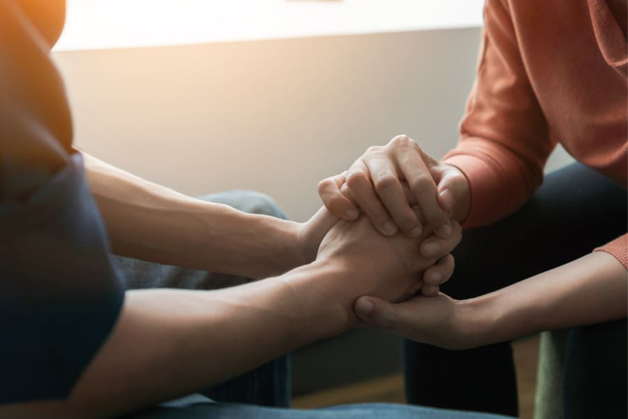 Doctor supporting a patient