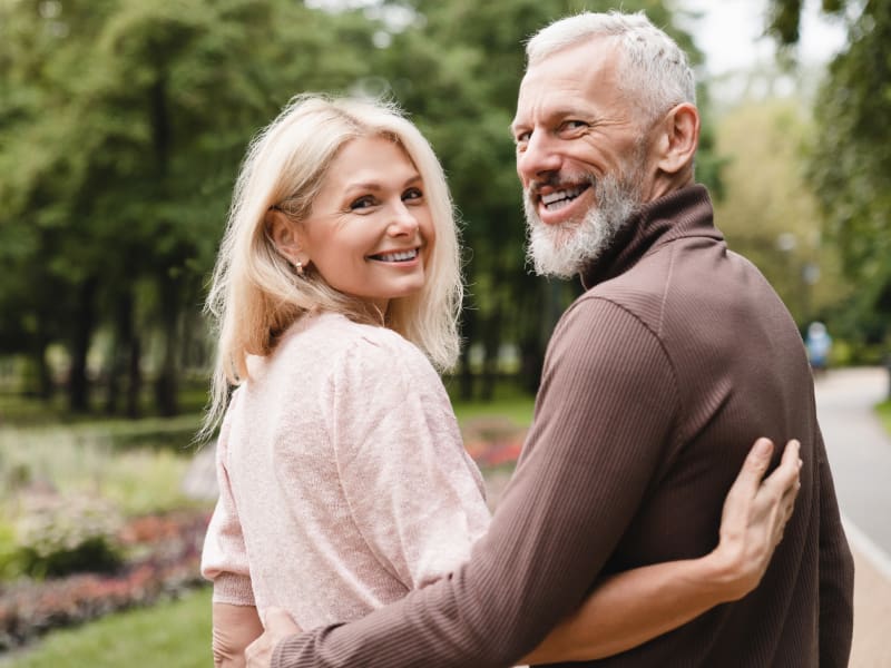 Couple in their 50s enjoying time outside