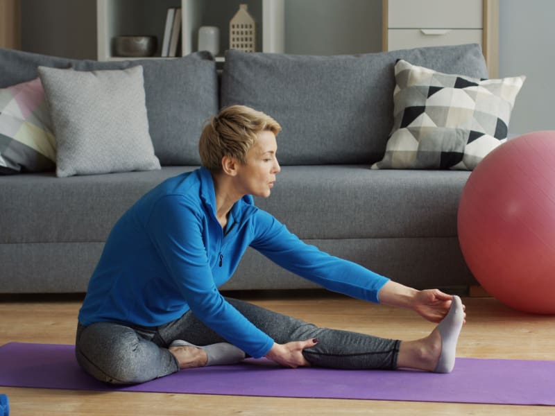 Woman stretching her leg